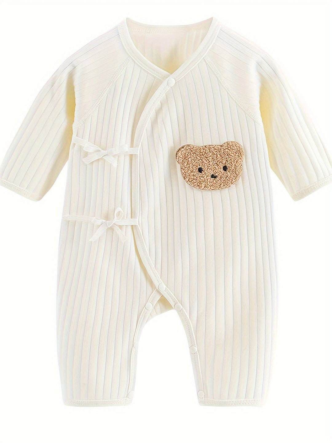 Comfortabele unisex babyromper met schattig berenmotief, lange mouwen. Ideaal als zachte babykleding of kraamcadeau.