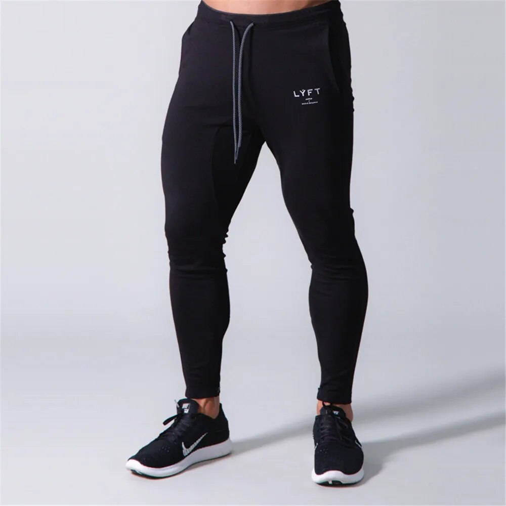 Stijlvolle heren slim-fit joggers voor sport en casual draagcomfort. Moderne tapered pasvorm, perfecte sportkleding.