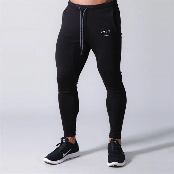 Stijlvolle heren slim-fit joggers voor sport en casual draagcomfort. Moderne tapered pasvorm, perfecte sportkleding.