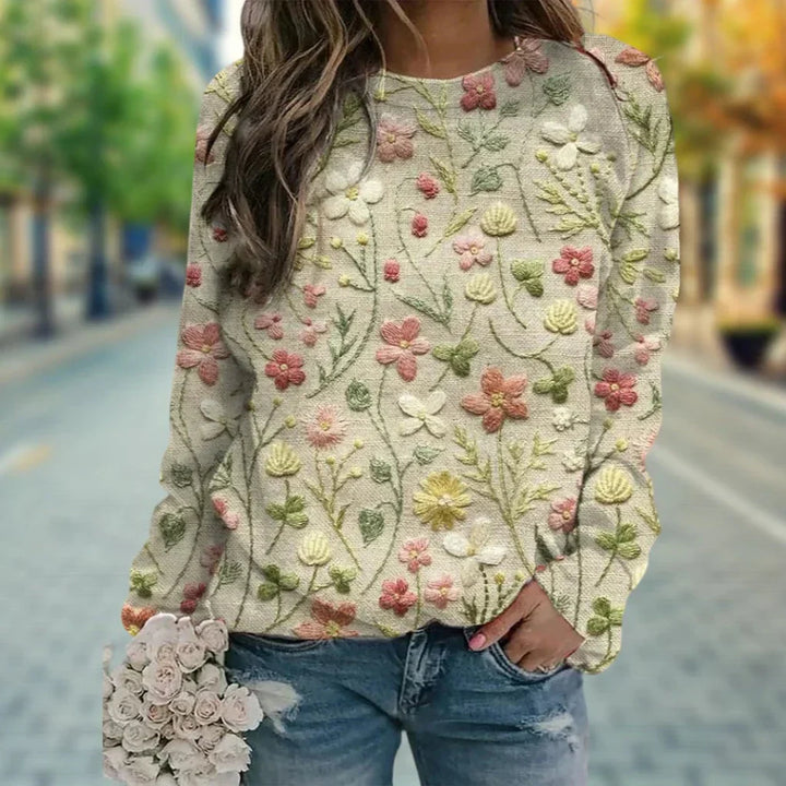 Stijlvolle dames lentetrui in gebreide pasteltint, met comfortabele ronde hals en relaxte pasvorm voor casual look.