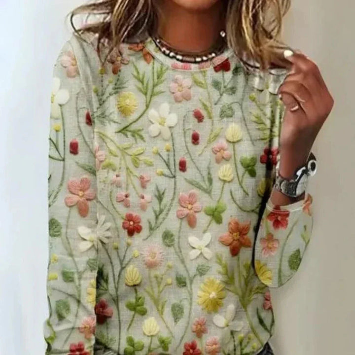 Comfortabele gebreide dames lentetrui met relaxte pasvorm. Ideaal voor een stijlvolle, casual look in pasteltinten.