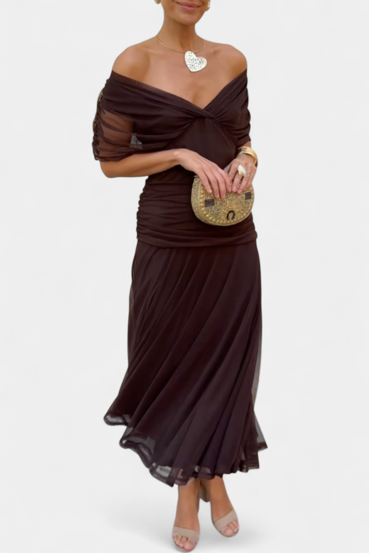 Elegante dames wikkeljurk met V-hals en midi-lengte. Ideaal als feestjurk of zomerjurk.