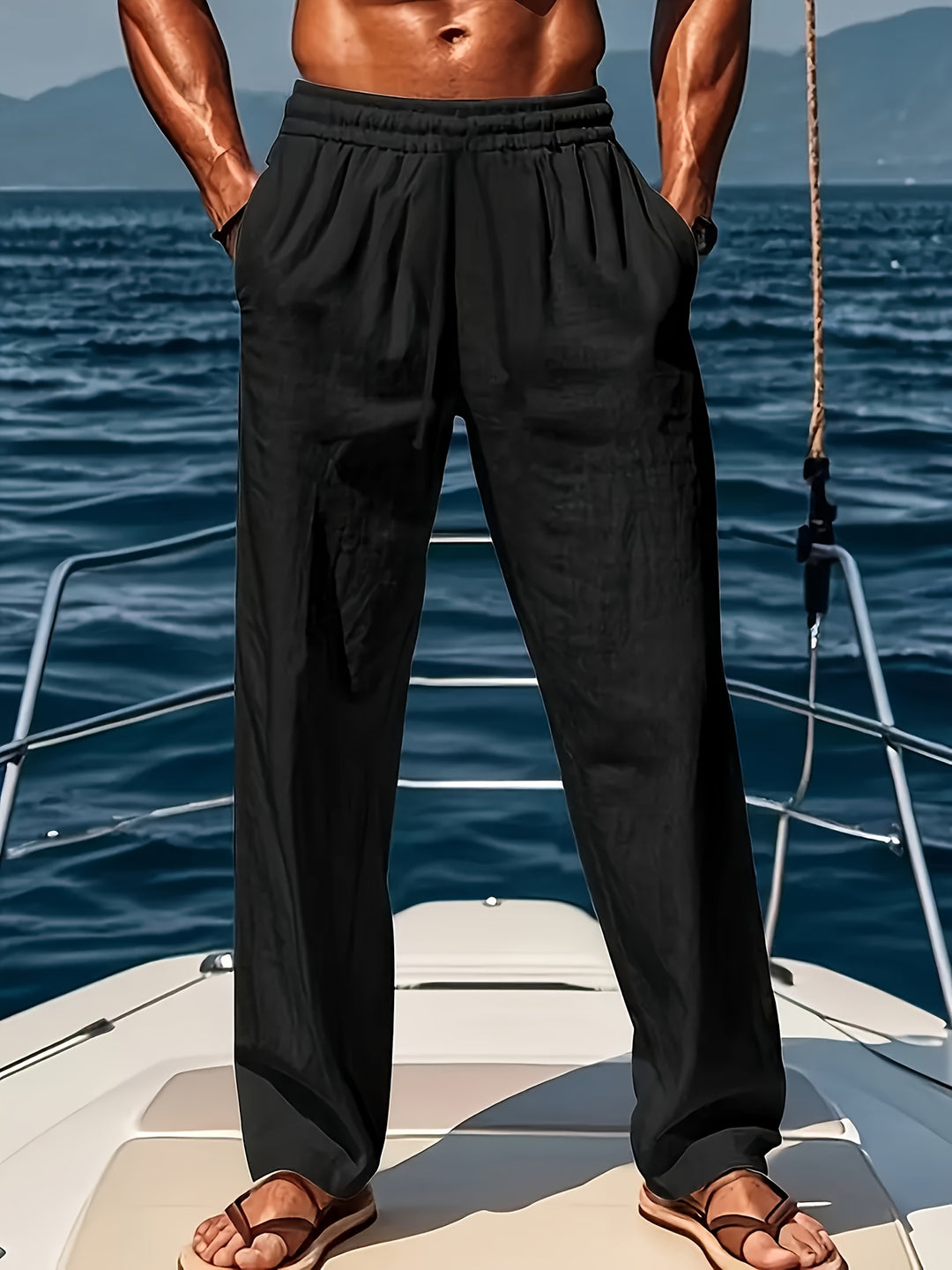 Volledig beeld van losse heren katoen-linnen broek. Comfortabele ademende pasvorm, perfect als yogabroek of strandbroek.
