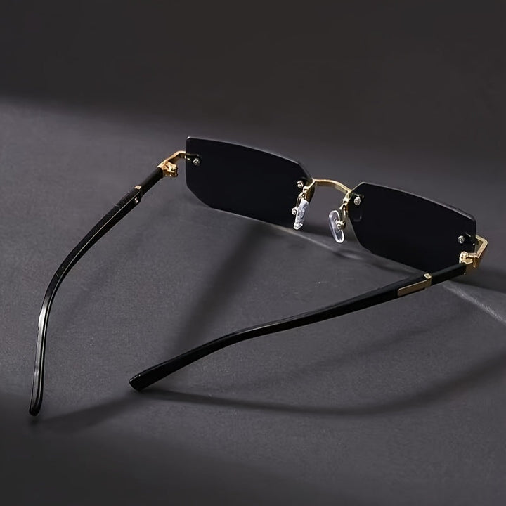 Elegante heren vintage bril, montuurloos met roestvrijstalen pootjes en vierkante lenzen voor een moderne look.