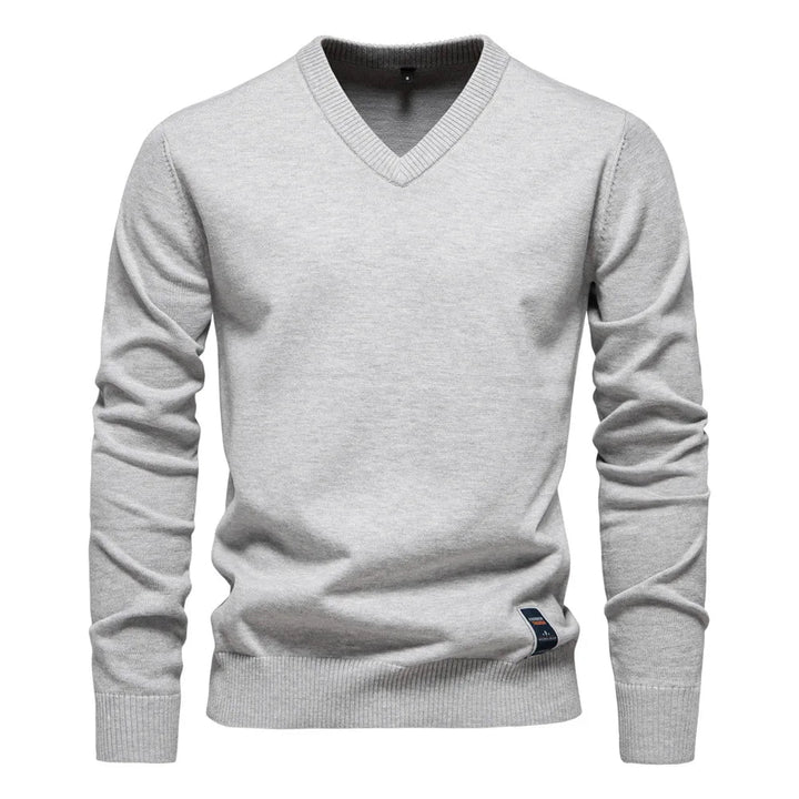 Heren V-hals trui met elegante pasvorm, veelzijdig voor casual en zakelijk gebruik. Hoogwaardige kleding.