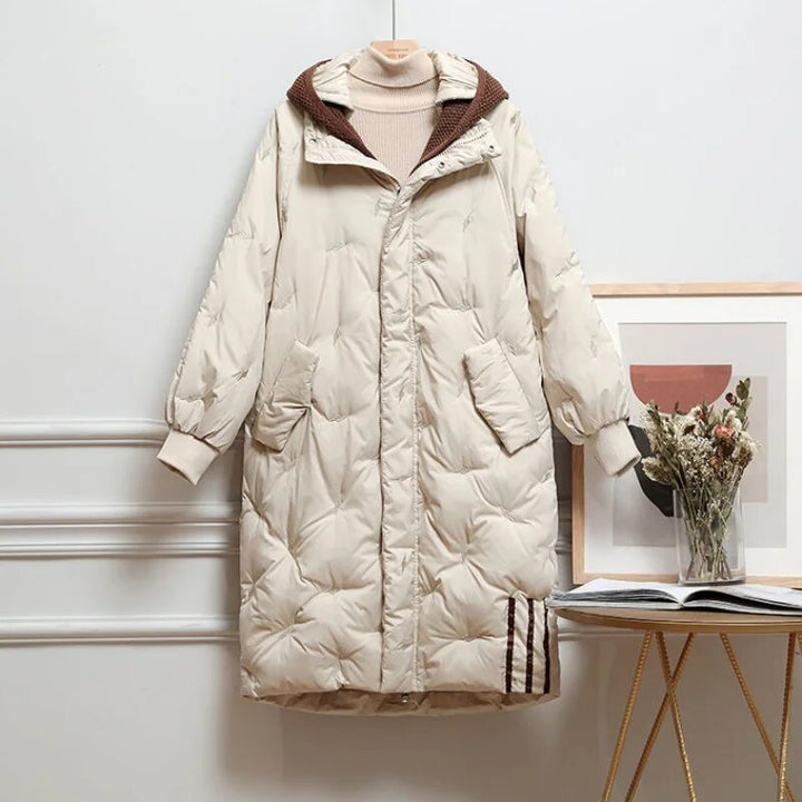 Warme comfortabele dames gevoerde jas, lange winterjas biedt optimale bewegingsvrijheid en winterse bescherming.
