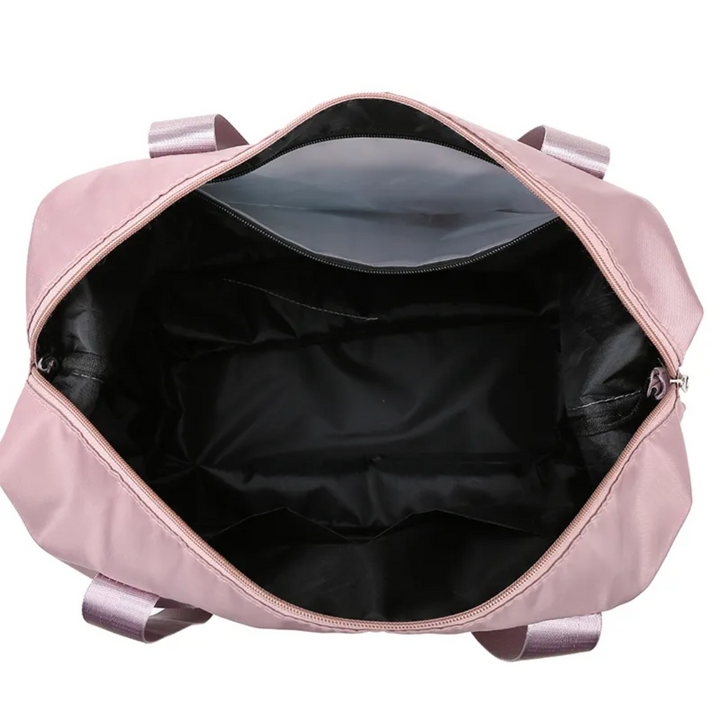 Dames reistas met handige trolley sleeve, past perfect op je koffer.