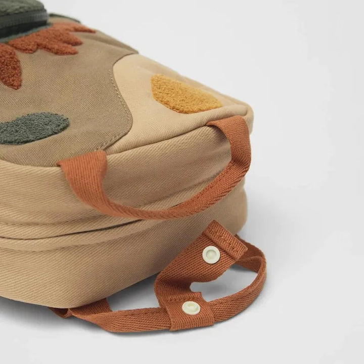 Avontuurlijke dinosaurus kinderrugzak, personaliseerbaar en stevig, perfect voor speeltijd en school.