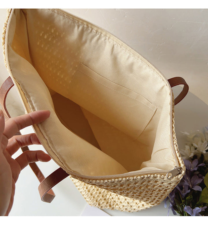 Veelzijdige unisex geweven korbtas met comfortabele handvatten, perfect als handtas of strandtas.