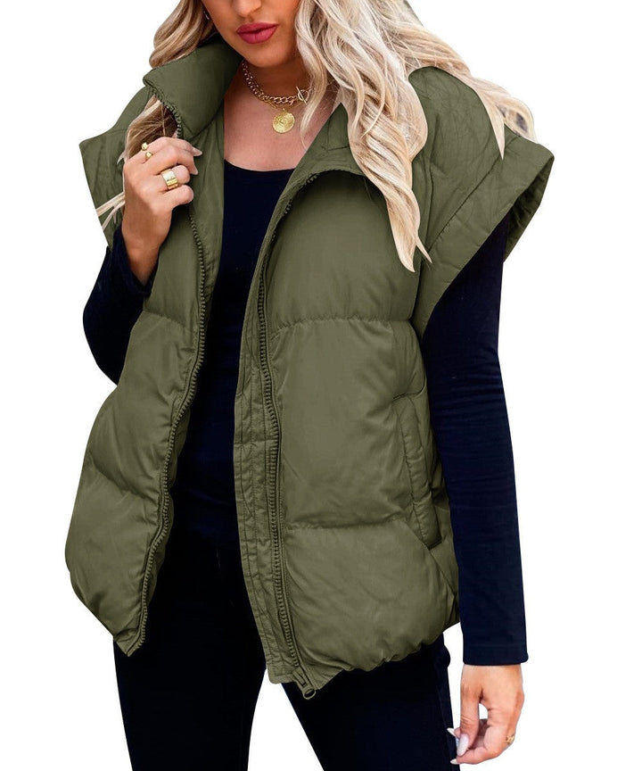 Comfortabel damesvest, gewatteerd puffer design, biedt warmte en stijl voor gelaagde looks tijdens de herfst.