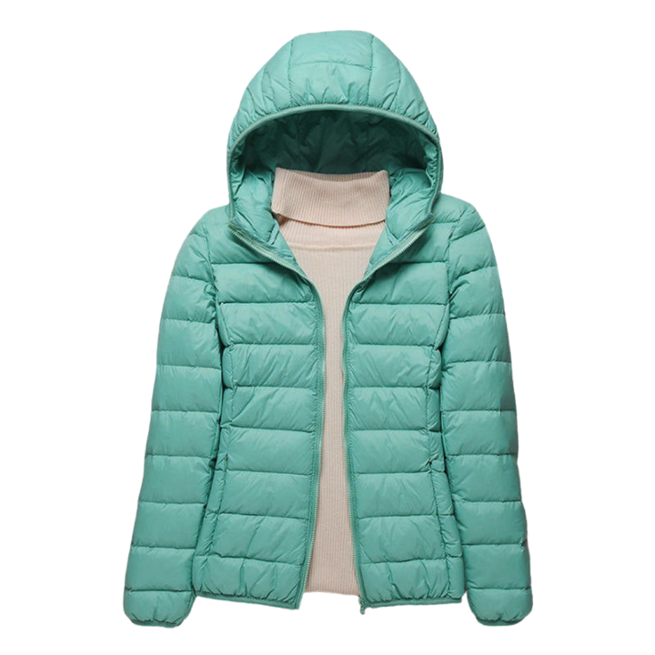Comfortabele en warme dames gewatteerde jas met capuchon, een veelzijdige keuze voor koelere dagen.