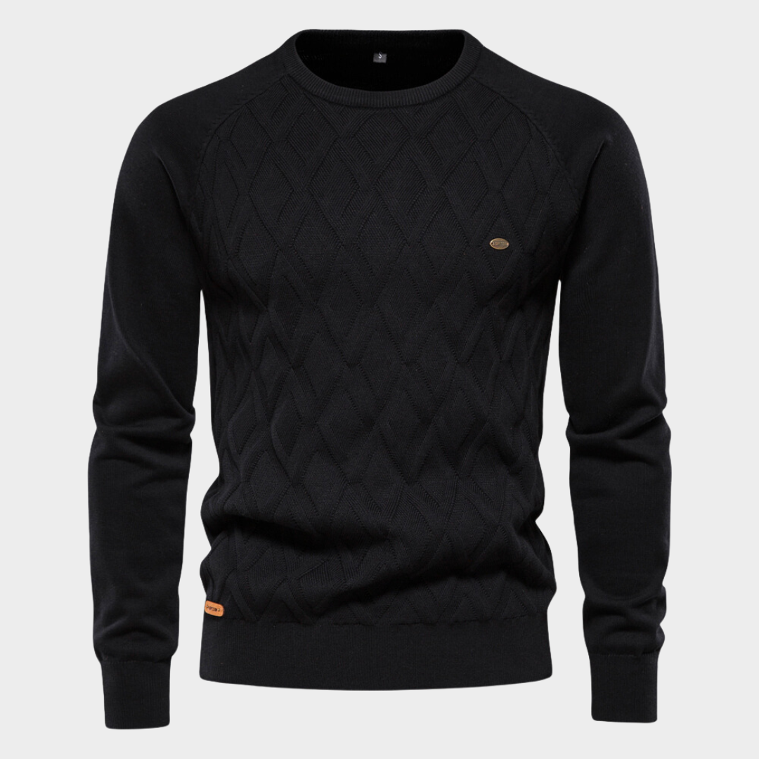 Close-up van luxe heren ronde hals trui, zachte stof en fijne afwerking. Comfortabele en warme wintertrui.