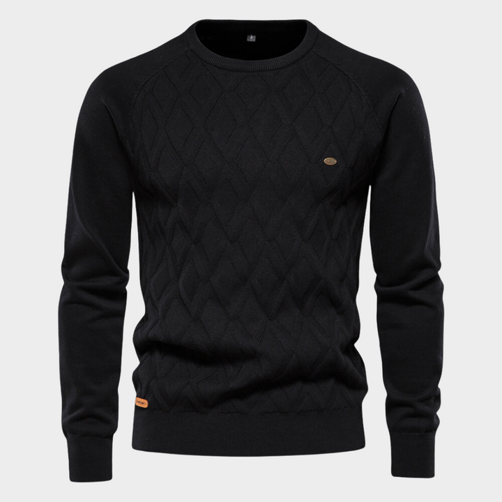 Close-up van luxe heren ronde hals trui, zachte stof en fijne afwerking. Comfortabele en warme wintertrui.