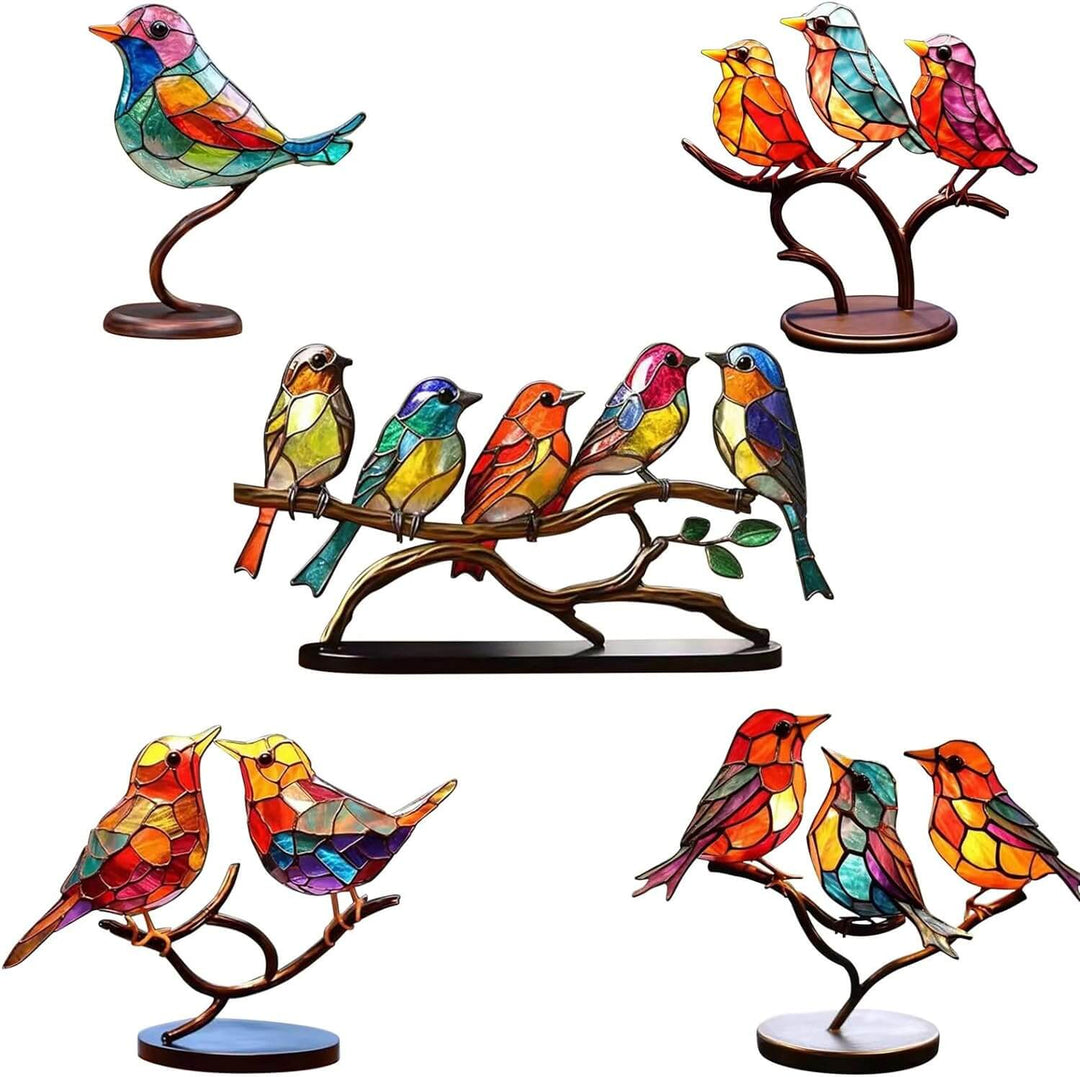 Uniek decoratief beeld met heldere, gekleurde vogels op een sierlijke tak. Voor een vrolijk interieur.