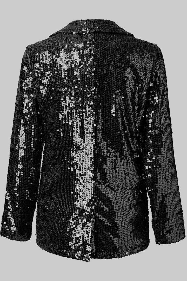 Chique dames blazer, rijk versierd met glinsterende pailletten. Ideaal voor feestelijke avondkleding.