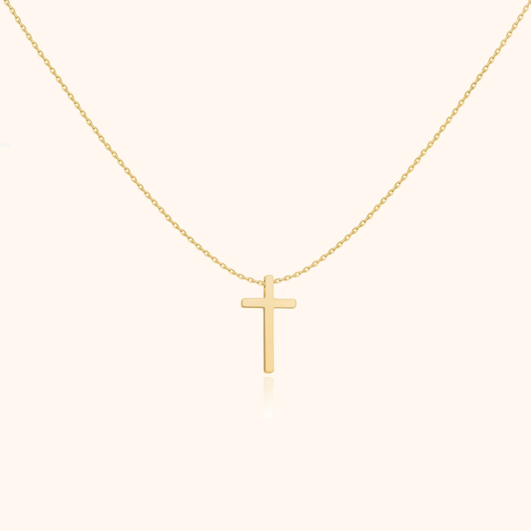 Elegante dames ketting met minimalistische kruis hanger, verkrijgbaar in zilver of goud. Perfect voor spirituele look.