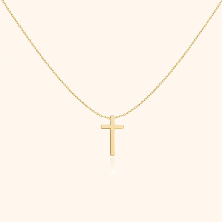 Elegante dames ketting met minimalistische kruis hanger, verkrijgbaar in zilver of goud. Perfect voor spirituele look.