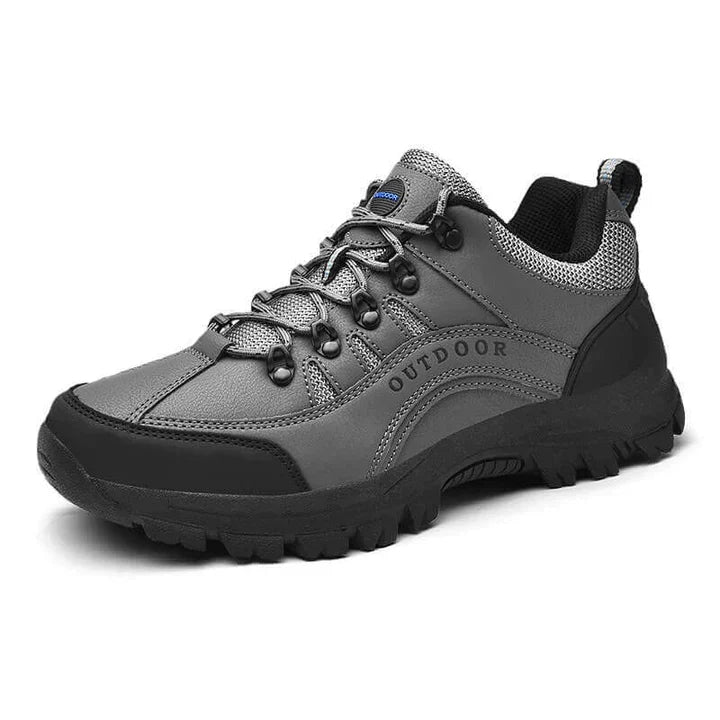Robuuste heren wandelschoenen voor buitenactiviteiten. Orthopedisch comfort en steun tijdens trekking en avontuur.