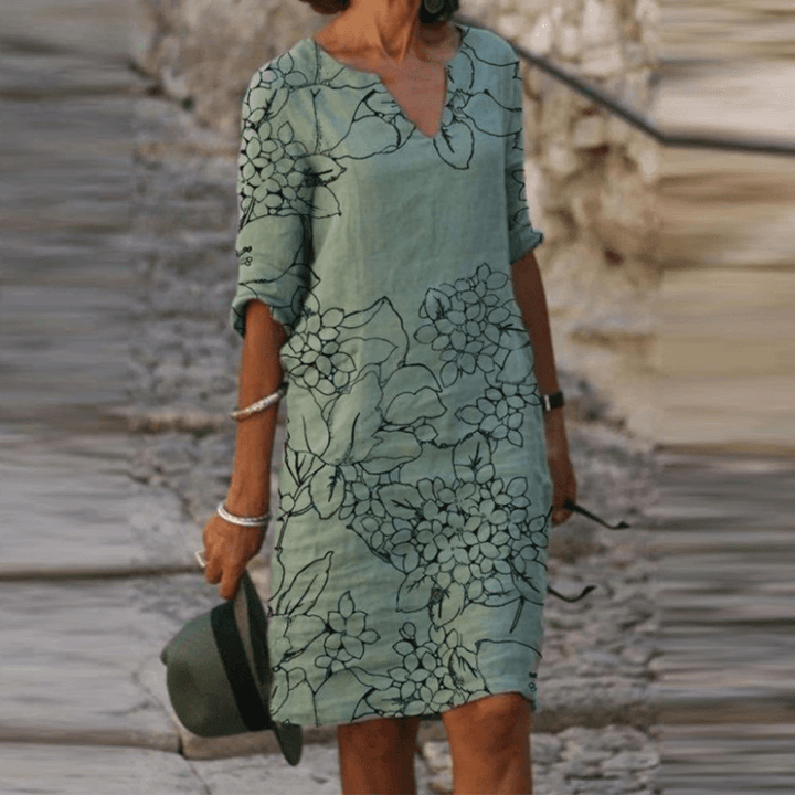 Veelzijdige elegante jurk voor dames, vintage look met driekwart mouw en subtiele bloemenprint.