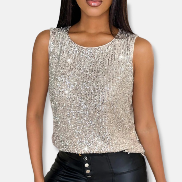 Mouwloze feesttop voor dames in sprankelend wit met pailletten. Ideaal voor een stijlvolle avondlook.