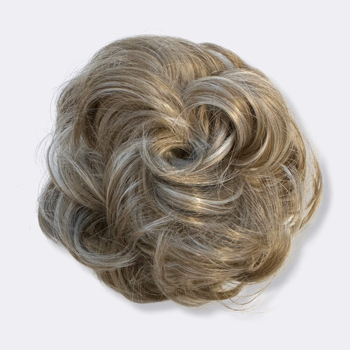 Volumineuze knot creëren? Gebruik deze hairextensie scrunchie voor een perfect resultaat.