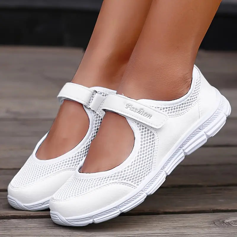 Grijze dames sneakers met klittenbandsluiting en open wreef; stijlvol, comfortabel en veelzijdig voor dagelijks gebruik.