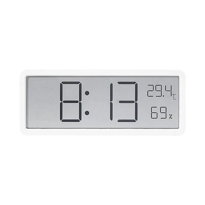 "Grote digitale wandklok met helder LED display, temperatuur- en vochtigheidssensor, ontwerp voor huis en kantoor."