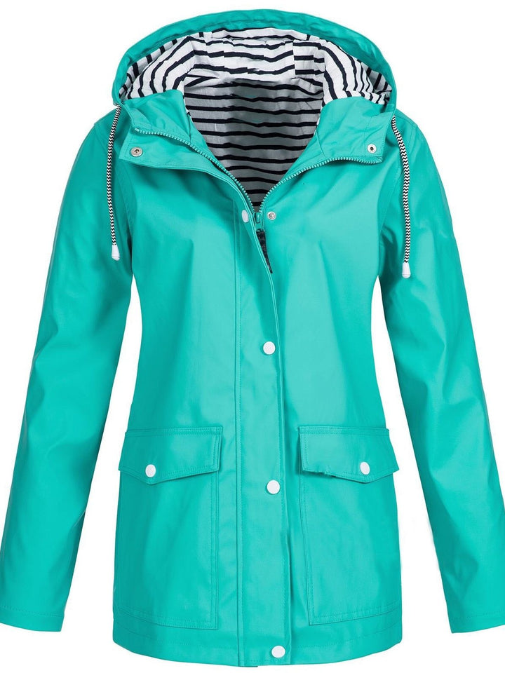 Detail taille met riem van de Sophie dames trenchcoat, waterdicht, chic en comfortabel.