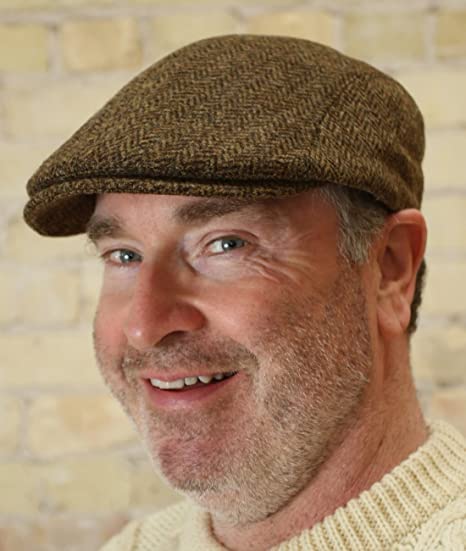 Gedetailleerde grijsbruine tweed flatcap, wollen Ierse hoed, klassiek unisex model, perfect voor winter.