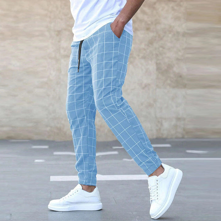 Geruite heren joggingbroek in slimfit model, ideaal voor casual en comfortabele vrijetijd. Moderne mannenbroek.