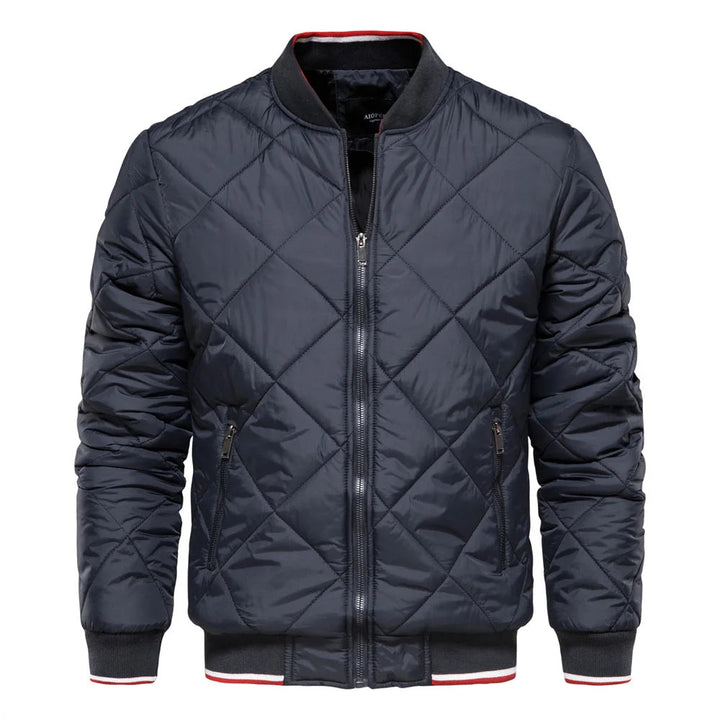 Marineblauw gewatteerd heren bomberjack, perfect voor een casual en warme look.