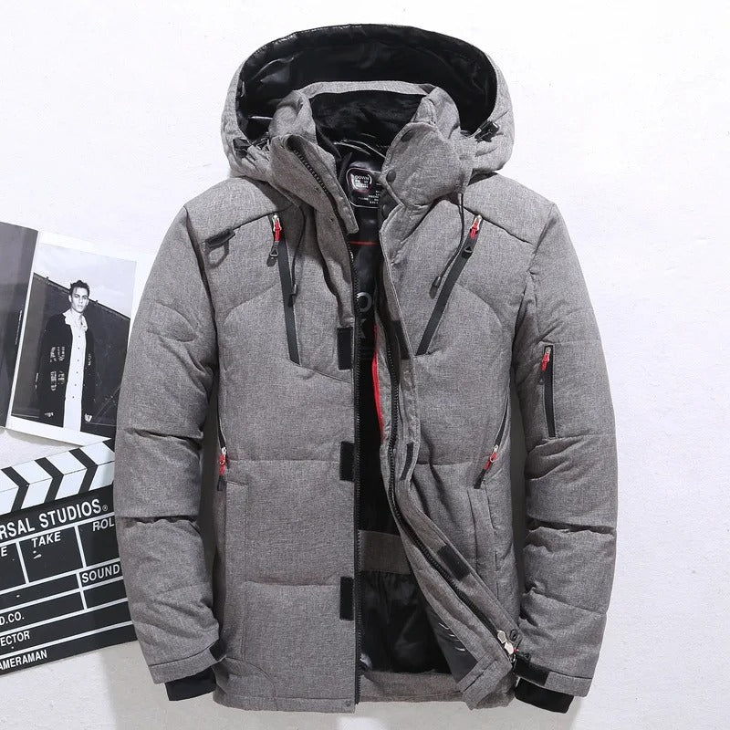 Comfortabele heren gewatteerde jas met capuchon, warm en veelzijdig. Een essentiële winterjas voor elke man.