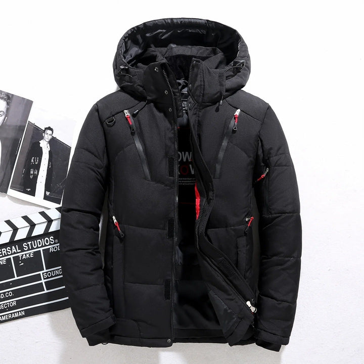 Heren gewatteerde winterjas met capuchon, warm en stijlvol, ideaal voor koude dagen. Casual herenbovenkleding.