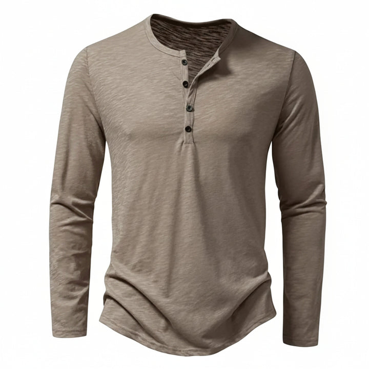 Stijlvol heren Henley shirt met lange mouwen. Comfortabel en veelzijdig, perfect voor een dagelijkse casual look.