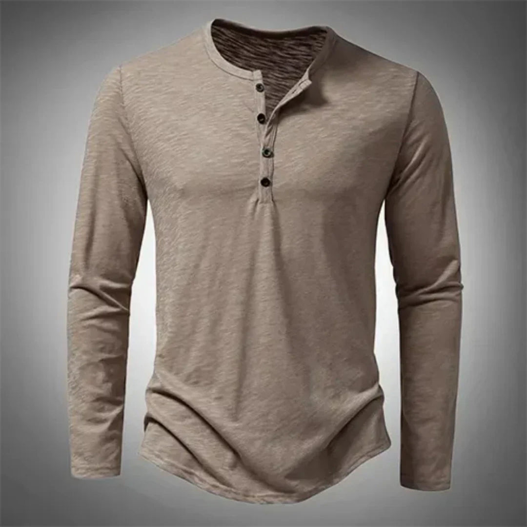 Heren Henley shirt lange mouw met klassieke knoopsluiting. Comfortabele regular fit voor een trendy herenmode look.