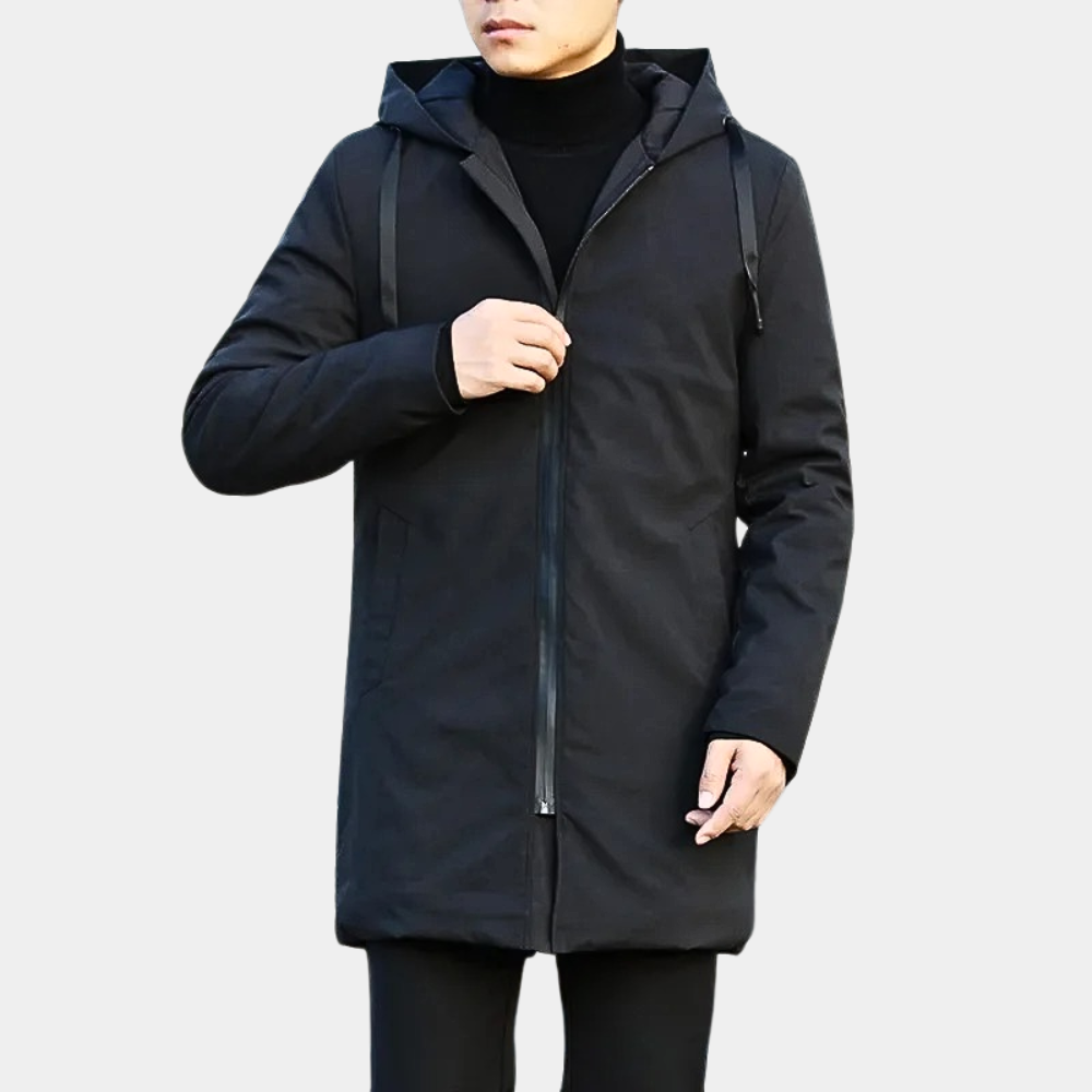 Lange herenjas met capuchon en rits. Deze casual longline jas biedt warmte en een stijlvolle look.