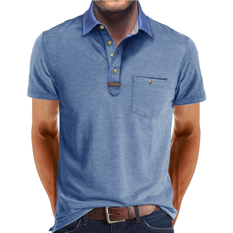 Kwalitatieve heren polo, regular fit, korte mouw, met contrasterende kraag en borstzak. Perfect voor heren.