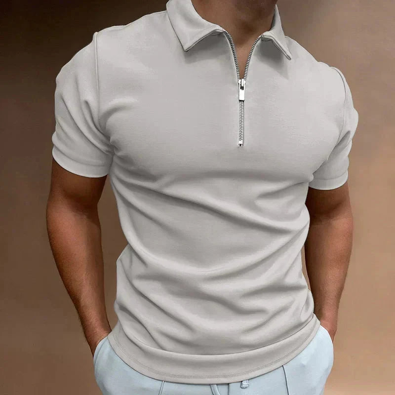 Trendy heren polo met korte mouwen, halve ritssluiting en polokraag. Ideaal voor een stijlvolle, veelzijdige look.