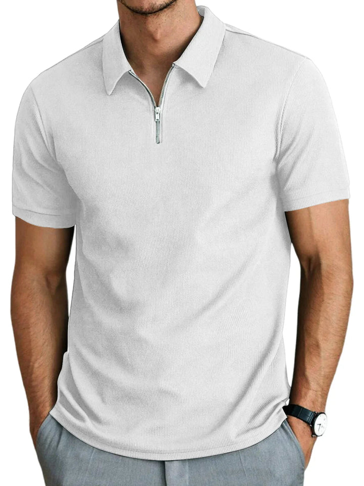 Dit comfortabele heren poloshirt met korte mouwen, rits en trendy design is de ideale zomerkleding.