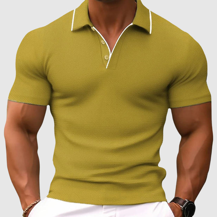 Comfortabel heren poloshirt met contrasterende kraag. Een stijlvolle keuze voor lente/zomer herenmode.