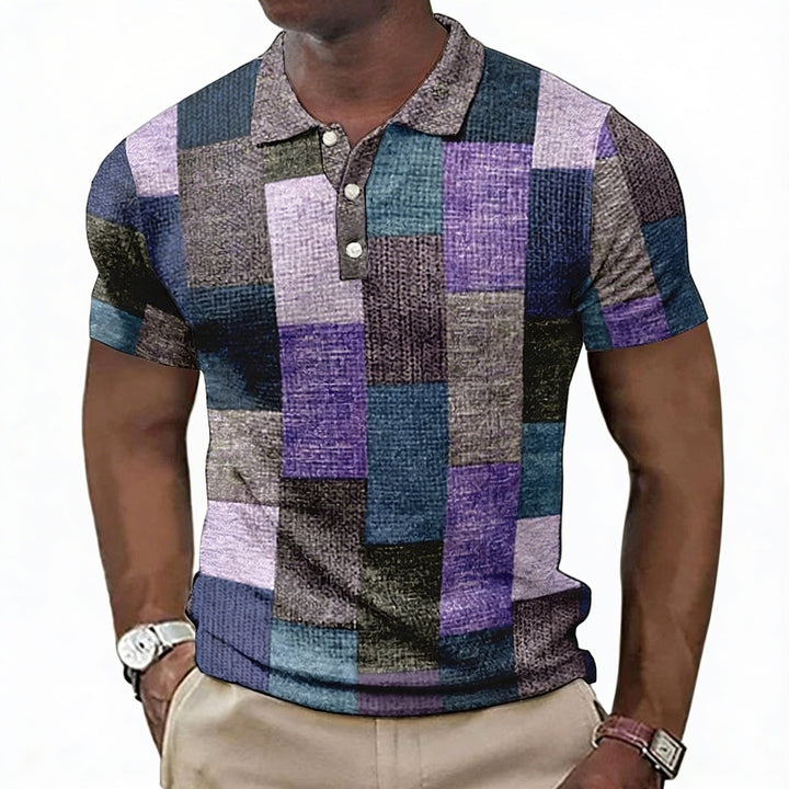 Opvallend heren poloshirt met modern geometrisch colorblock design. Ideaal voor een trendy casual zomerlook.