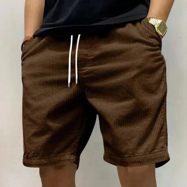 Stijlvolle heren shorts met ribtextuur, elastische taille en verstelbaar trekkoord, perfect voor de zomer.