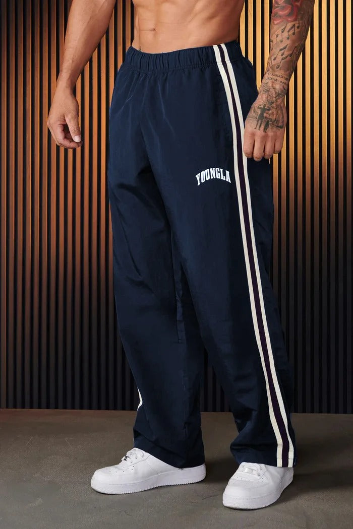 Heren sportbroek met dubbele strepen, veelzijdig voor fitness, hardlopen of een casual look.
