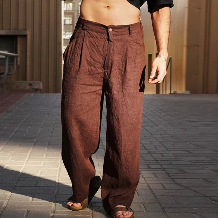 Smart casual heren broek met wijde geplooide pijpen, perfect voor een modieuze en comfortabele look.