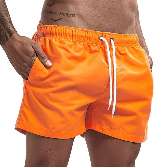 Veelzijdige heren zwemshort, sneldrogend en met trekkoord, ideaal voor recreatie en sport.