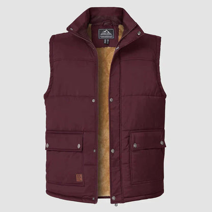 "Herfstige bodywarmer voor heren met meerdere zakken, ideale combinatie van functionaliteit en stijl voor buitenactiviteiten.