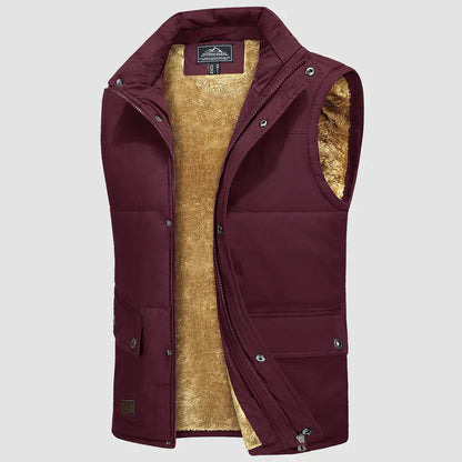 "Herfstige bodywarmer voor heren met meerdere zakken, ideale combinatie van functionaliteit en stijl voor buitenactiviteiten.