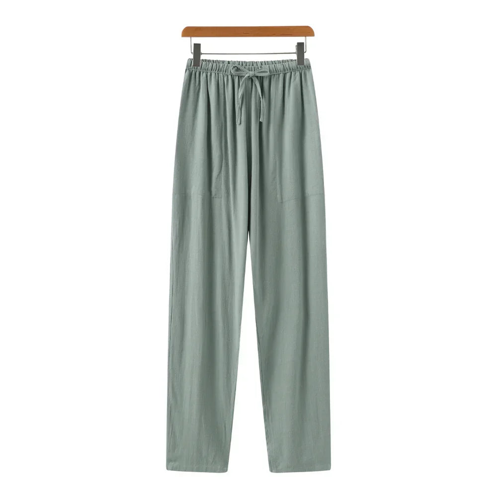 Taille en sluiting van de heren slim fit linnen pantalon. Rechte pijp, comfortabel en stijlvol design.
