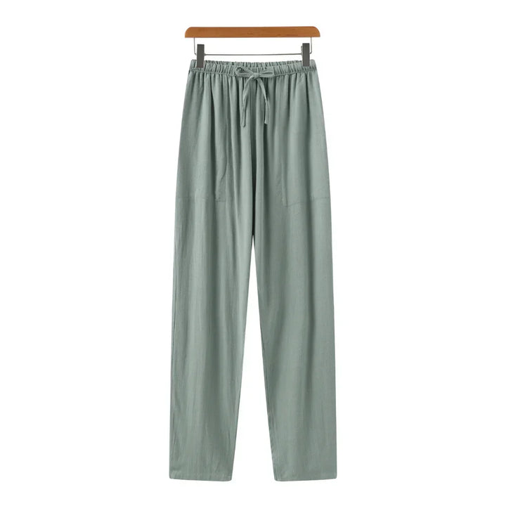 Taille en sluiting van de heren slim fit linnen pantalon. Rechte pijp, comfortabel en stijlvol design.