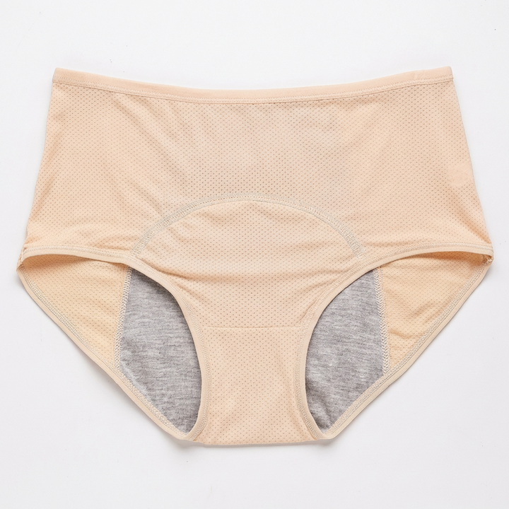 Model draagt naadloos vochtregulerend ondergoed, perfect voor een droog en comfortabel gevoel de hele dag.